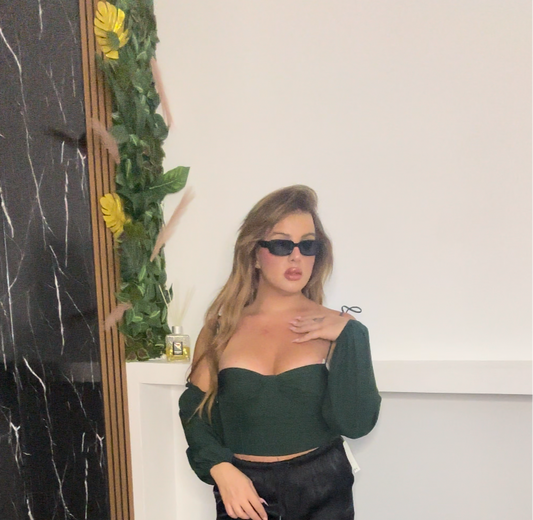 Top con manica svasata